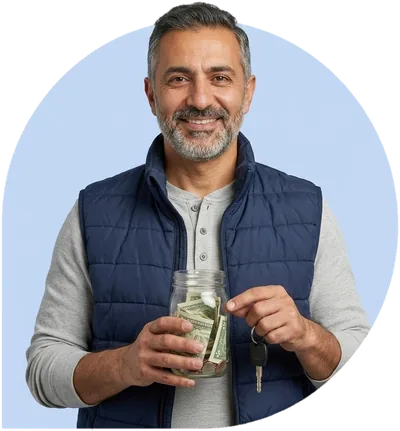 A rideshare driver holding a glass jar of money set aside for tax, his car key in the other hand.