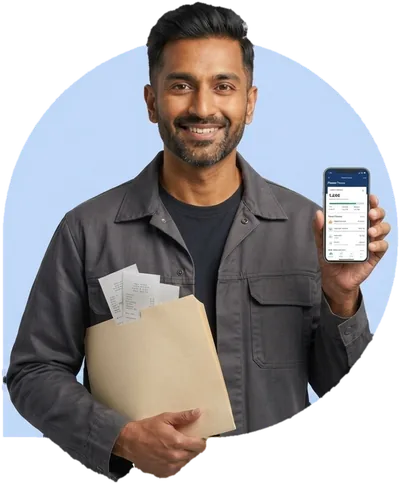 A tradesman holding an envelope of receipts and a phone showing his drives.
