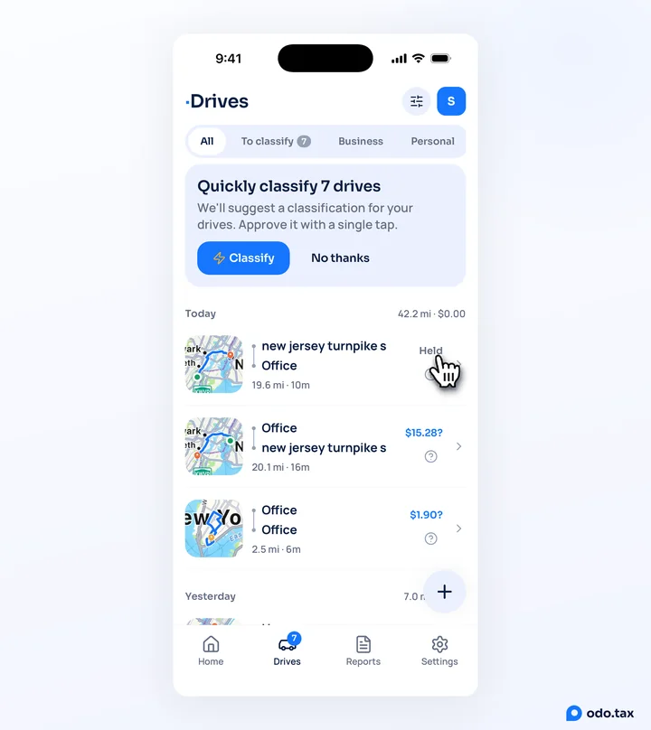 Drives in OdoTax on an iPhone: a 19.6-mile drive down the New Jersey Turnpike in 10 minutes reads Held where its value would be, with the hand on Held.