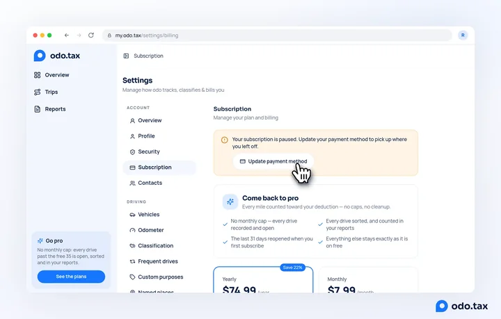 The Subscription page on the site with the plan paused: Your subscription is paused, and the hand on Update payment method.