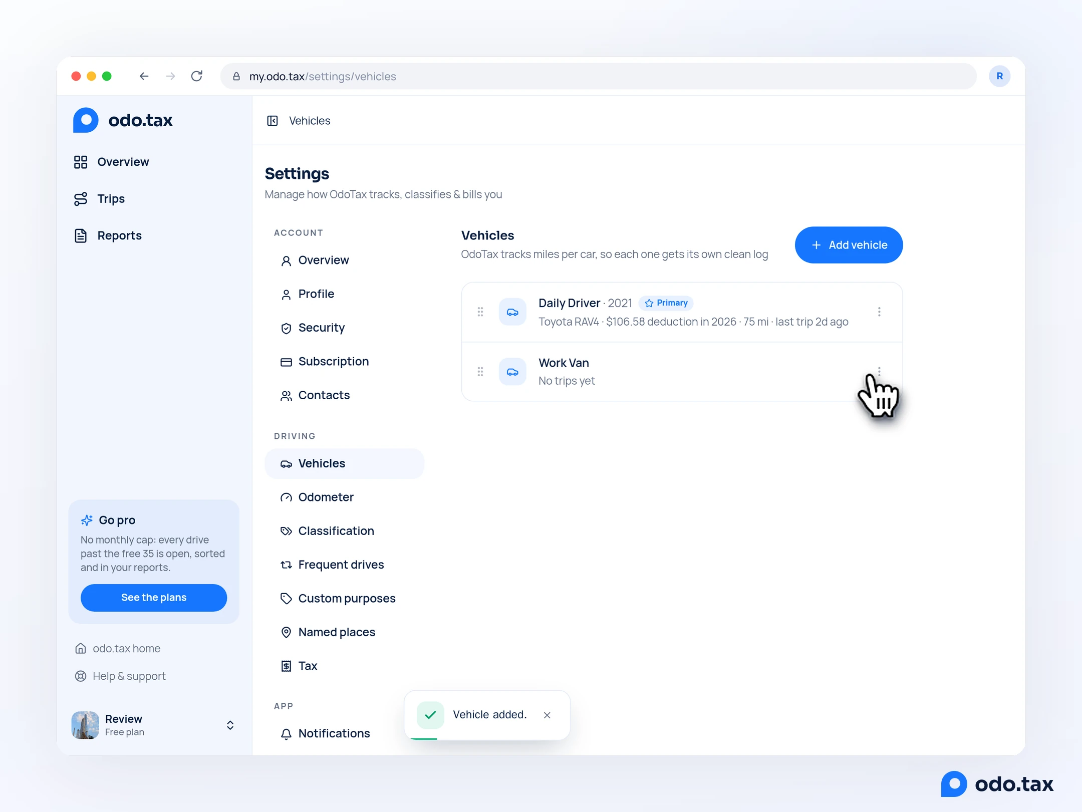Vehicles in the web account with a second car, Work Van, and the hand on its ⋮ menu.